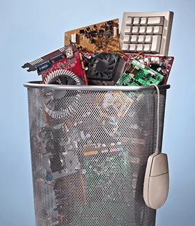 Electronic waste in a bin