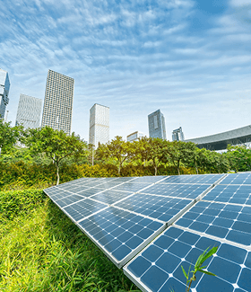 Solar panels with city skyline